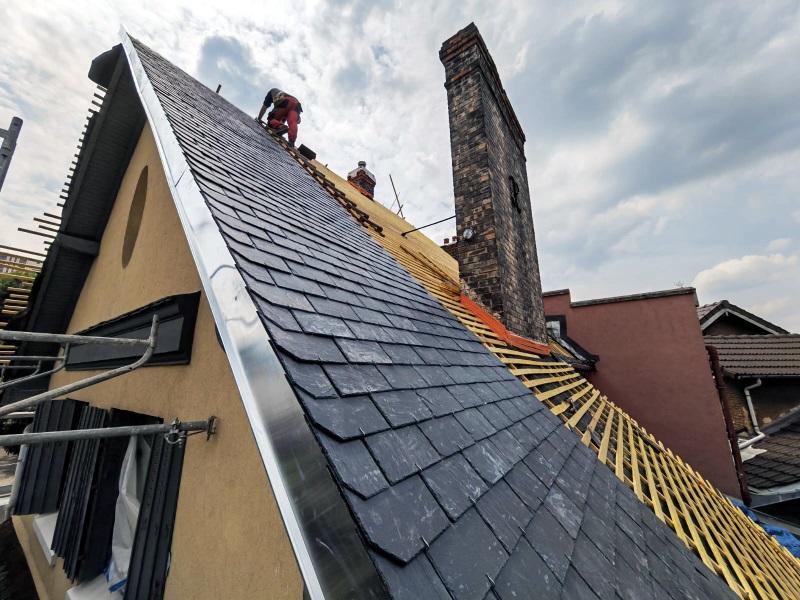 Rénovation d'une toiture en ardoise à Paris 19