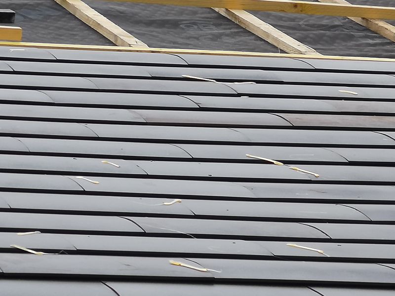 Rénovation de toiture en tuiles à Paris et en Île-de-France Tuile plate ardoise