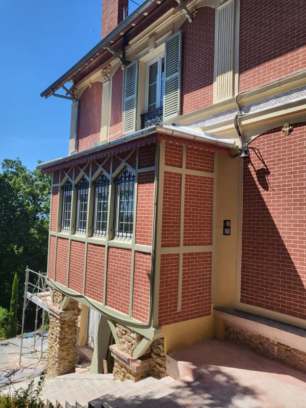 Renovation de facade en stuc brique et pierre
