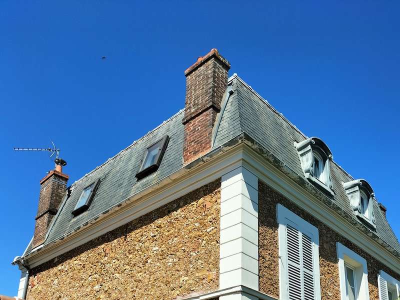 Rénovation de toiture en ardoise à Paris et en Île-de-France Couverture en ardoise