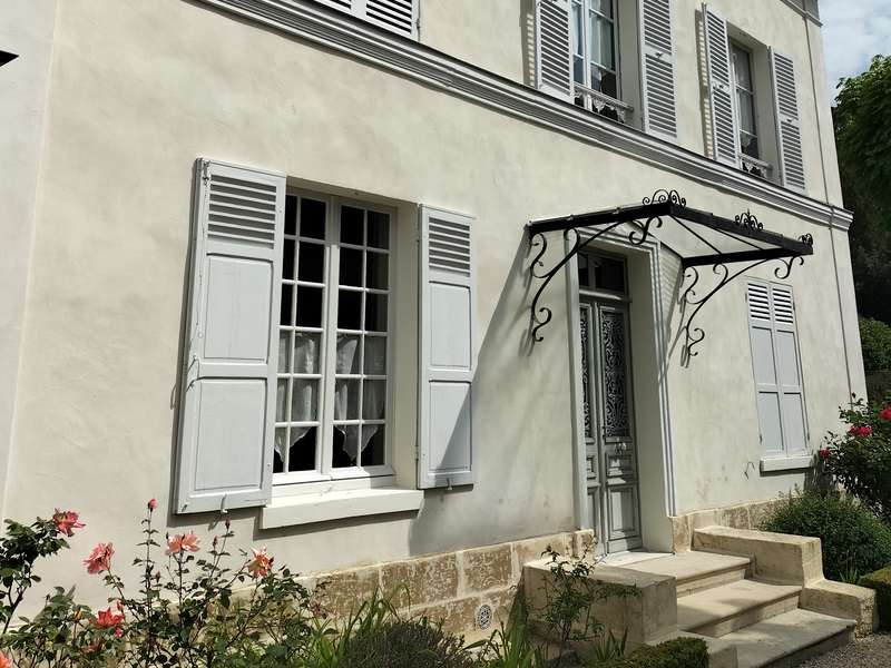 Enduit de façade à la chaux pour maison ancienne