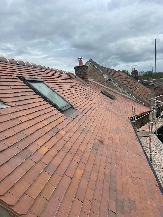 Renovation toiture en tuiles plates