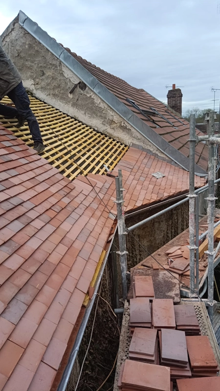 Renovation toiture tuiles plates
