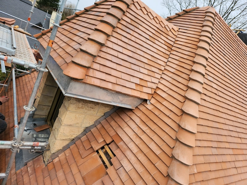 Pose toiture tuiles plates louveciennes